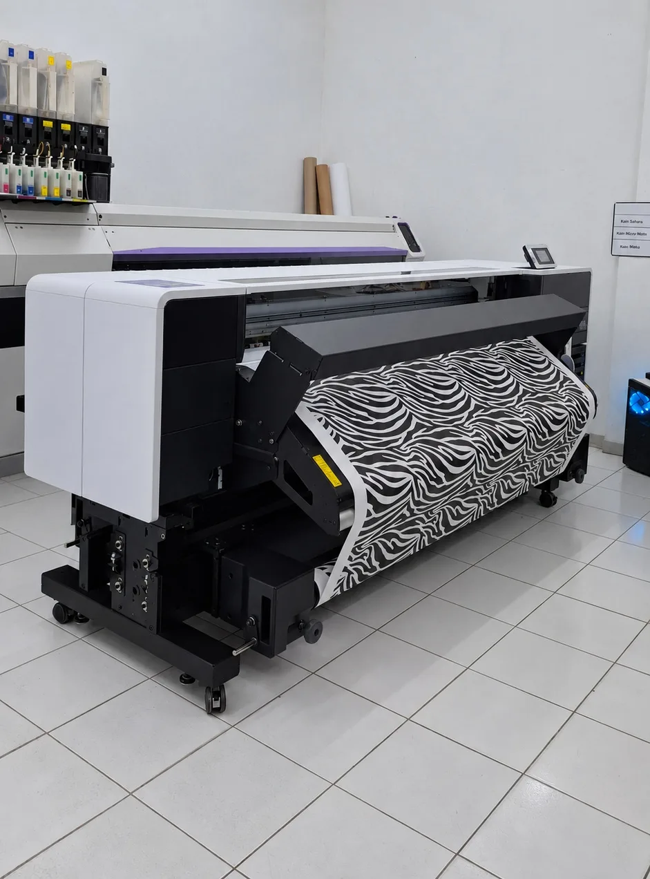 Large-format printer producing swim fabric prints in the Bali Swim print studio